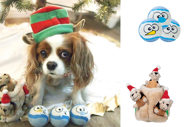 dogs with presents under christmas tree