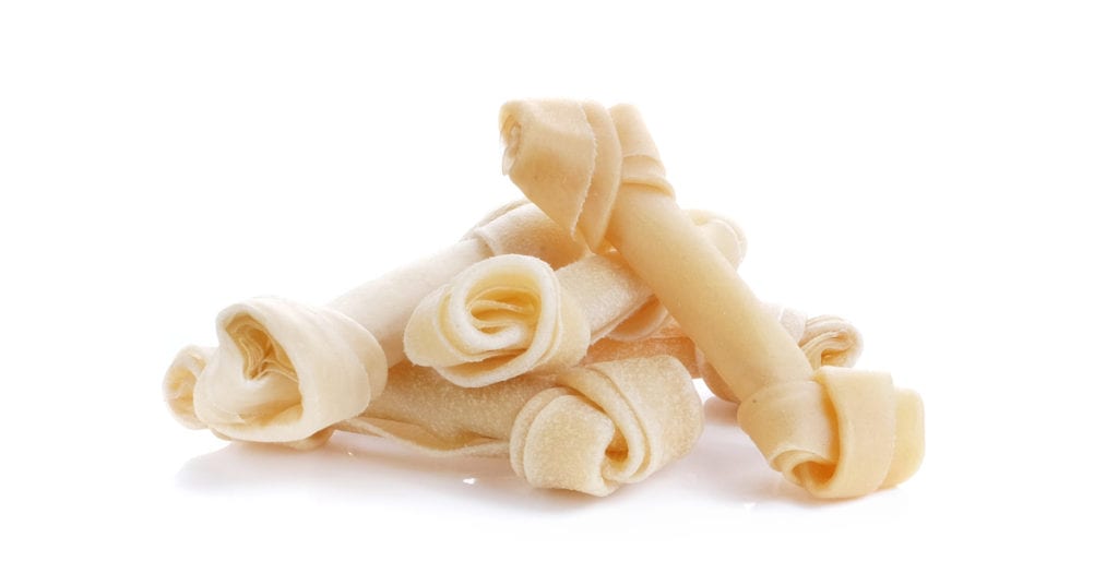 a stack of rawhide dog chews